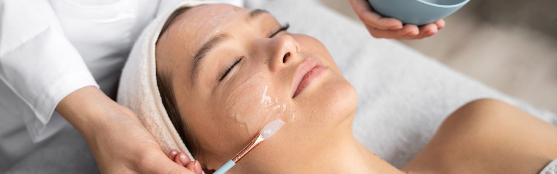 high-angle-woman-getting-massaged-at-spa
